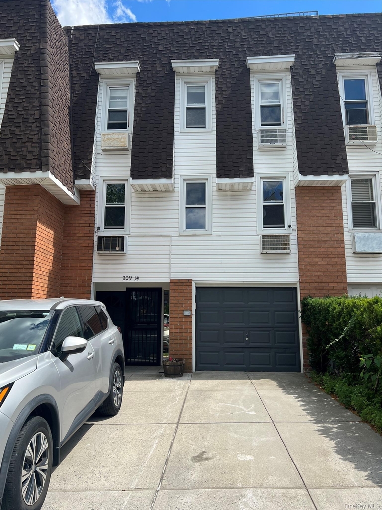 209-14 23rd Avenue - Photo 0