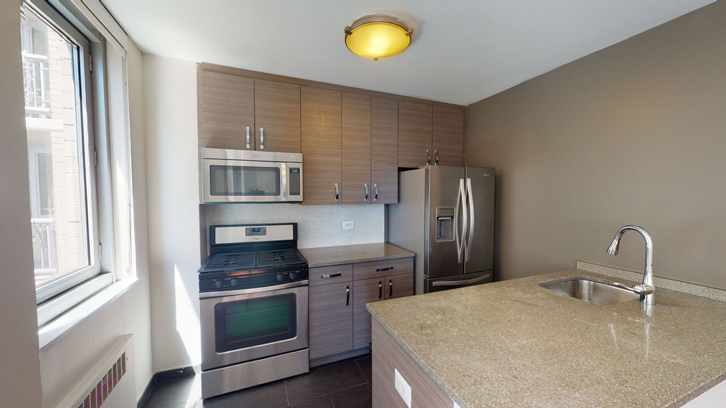 401 E 34th St - Photo 1