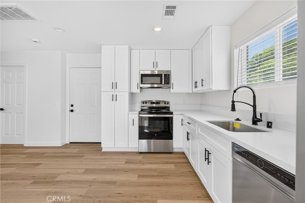 593 E 12th St - Photo 7