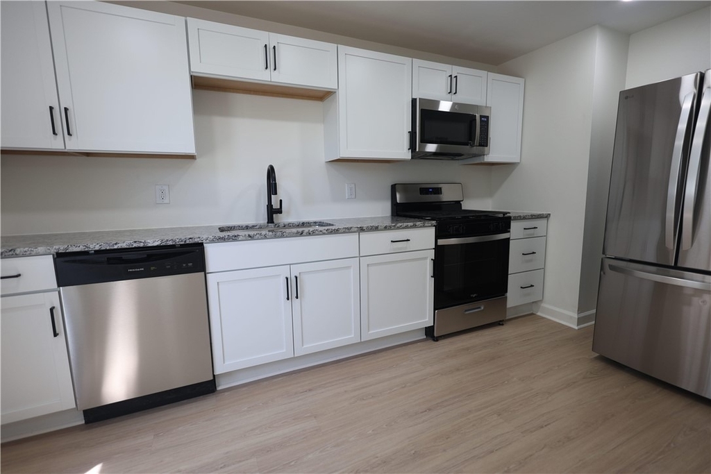 1615 Manhattan St - Photo 2