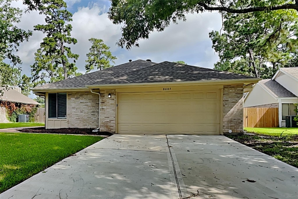 8607 Pines Place Drive - Photo 0