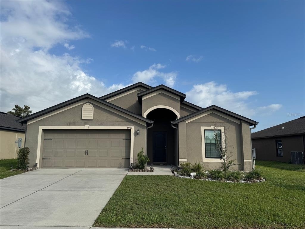 6909 Crested Orchid Drive - Photo 0