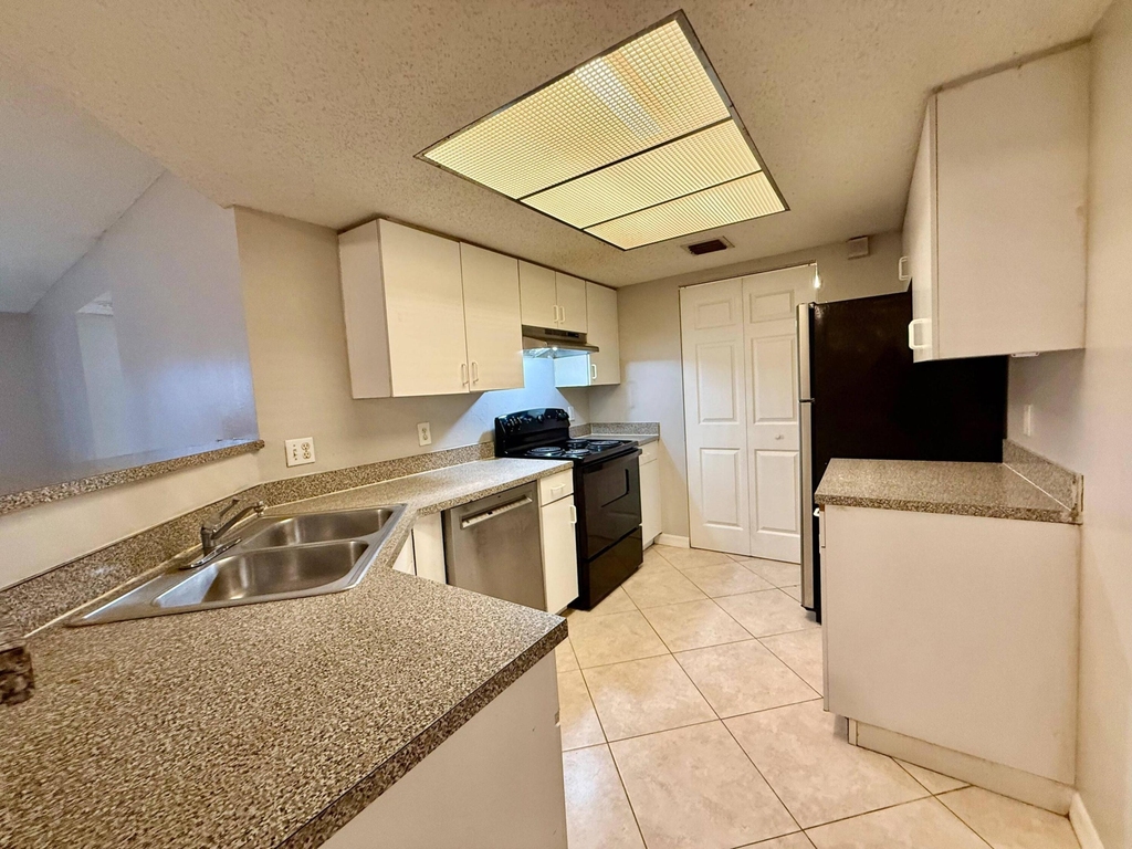 5065 Wiles Road - Photo 0