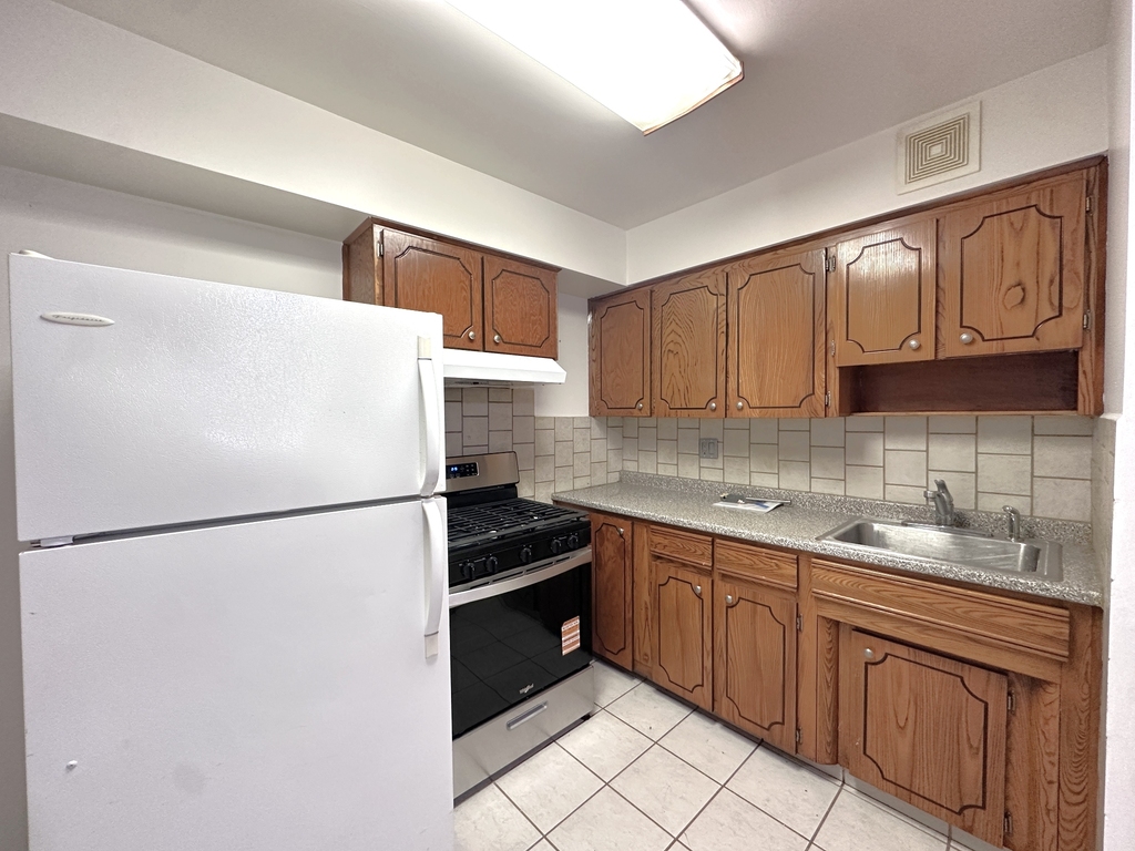 65-12 Maurice Avenue - Photo 1