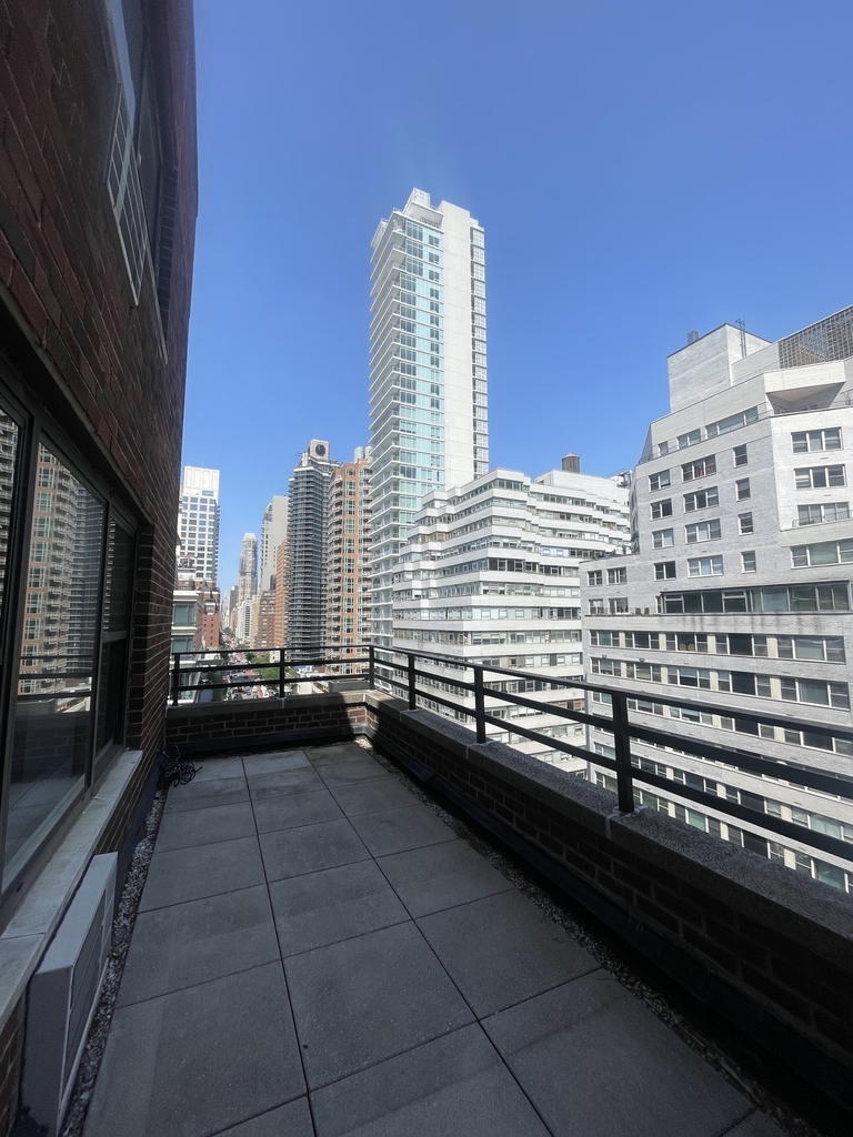  157 East 57th Street, 16A - Photo 1
