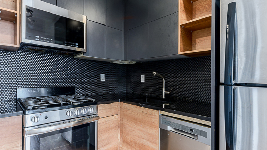 217 Malcolm X Blvd - Photo 3