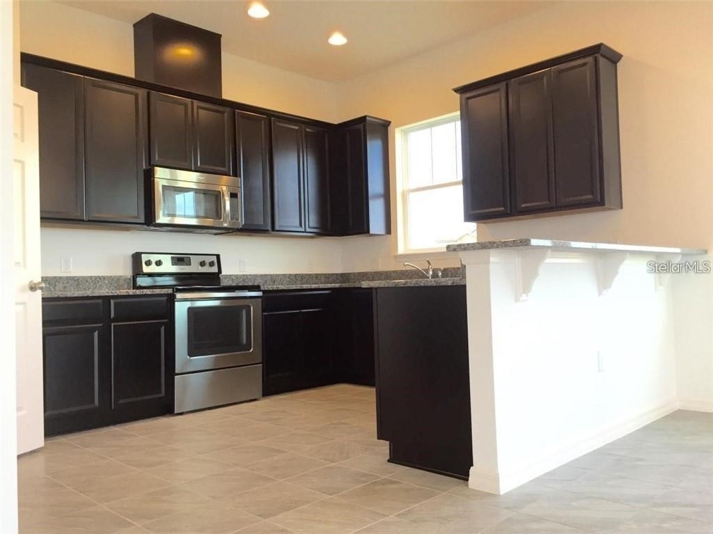 9350 Woodcrane Drive - Photo 4