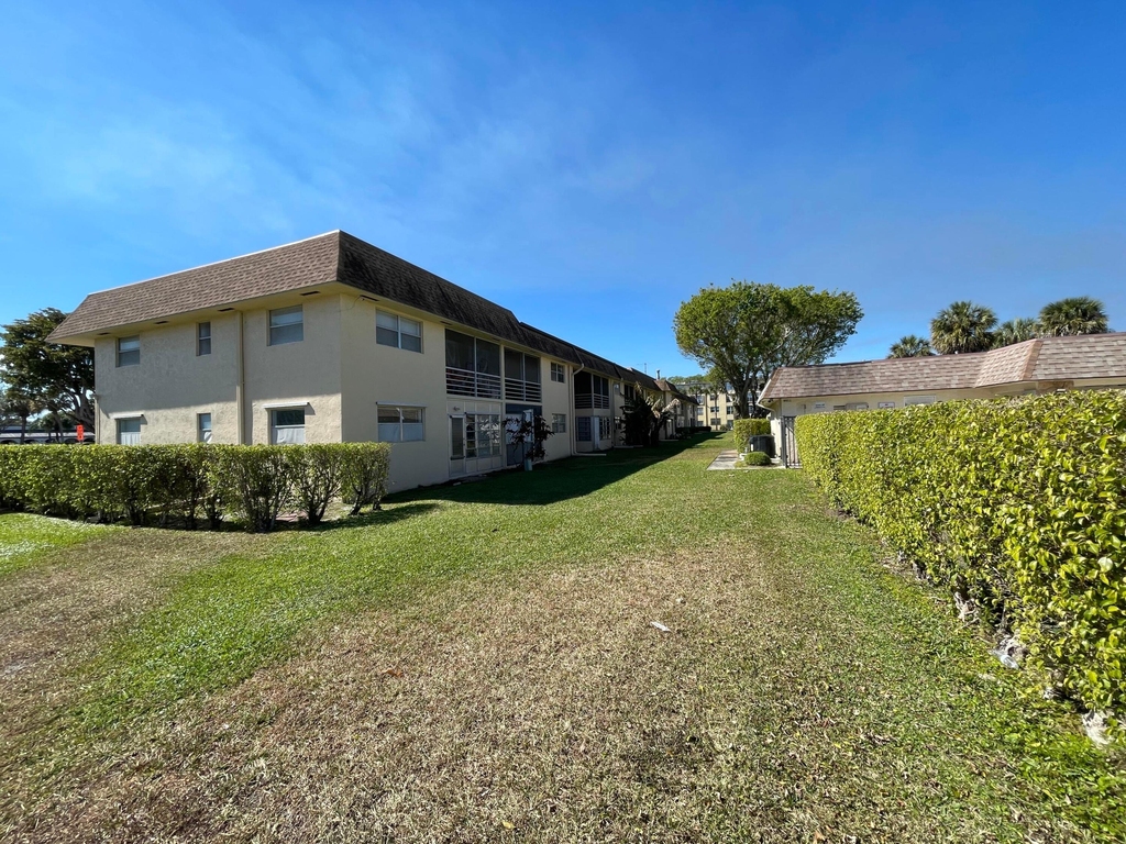 9911 Sandalfoot Boulevard - Photo 1