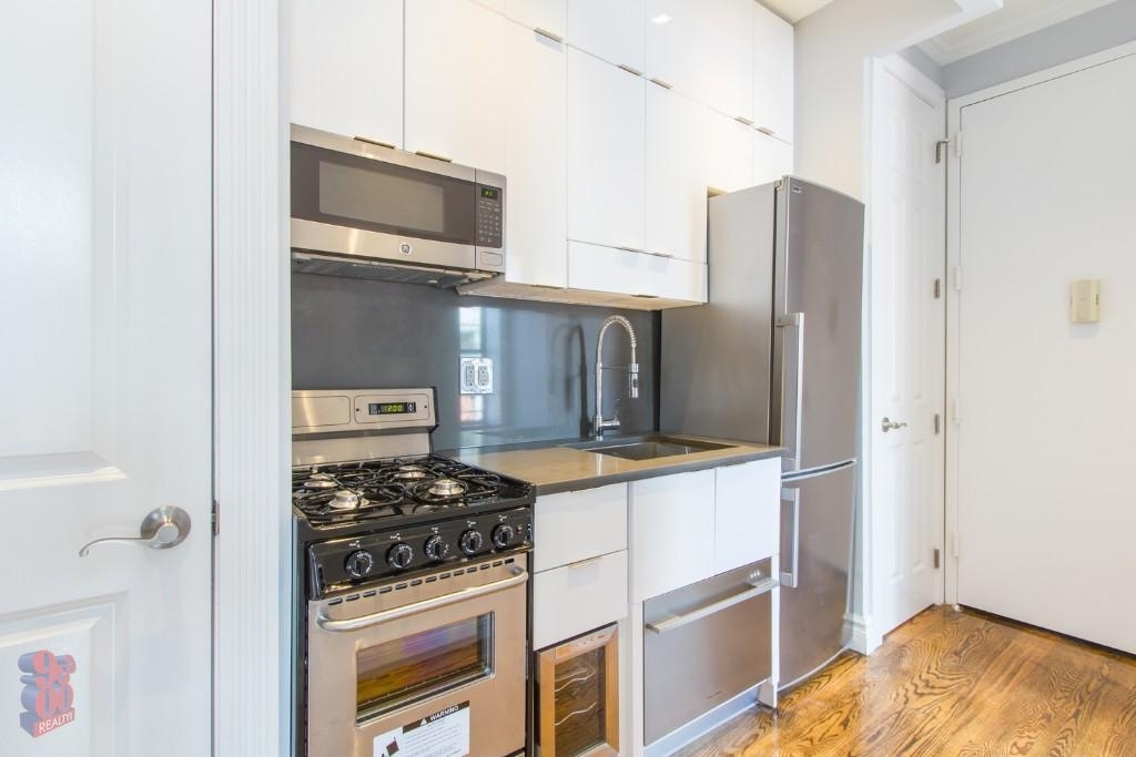 E 13TH ST. - Photo 3