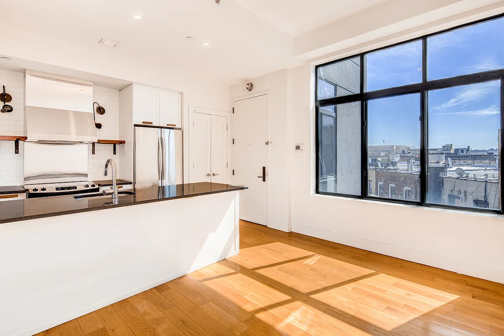 55-27 Myrtle Avenue - Photo 1