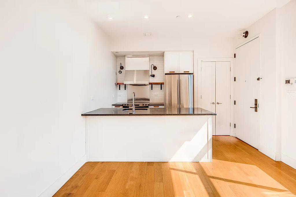 55-27 Myrtle Avenue - Photo 0