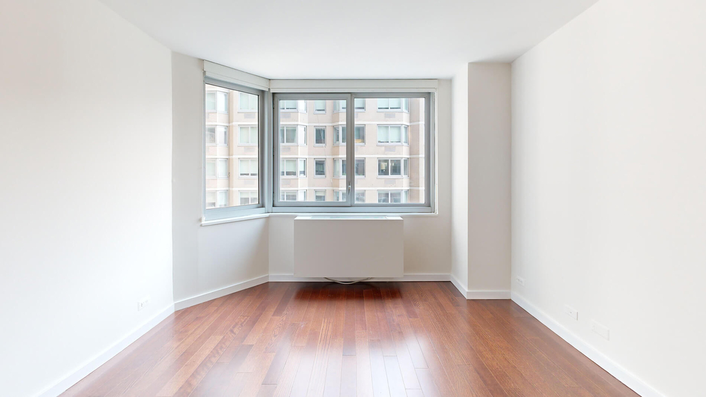 401 E 34th St - Photo 1