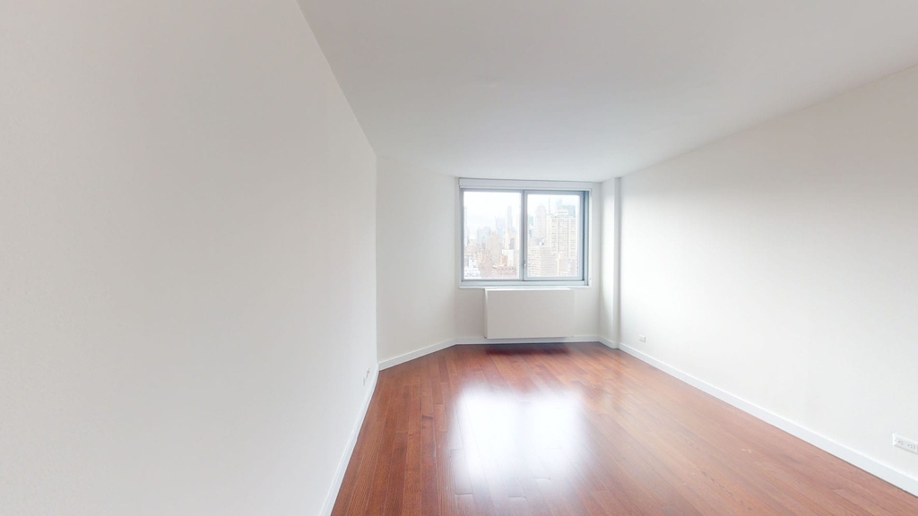 401 E 34th St - Photo 1
