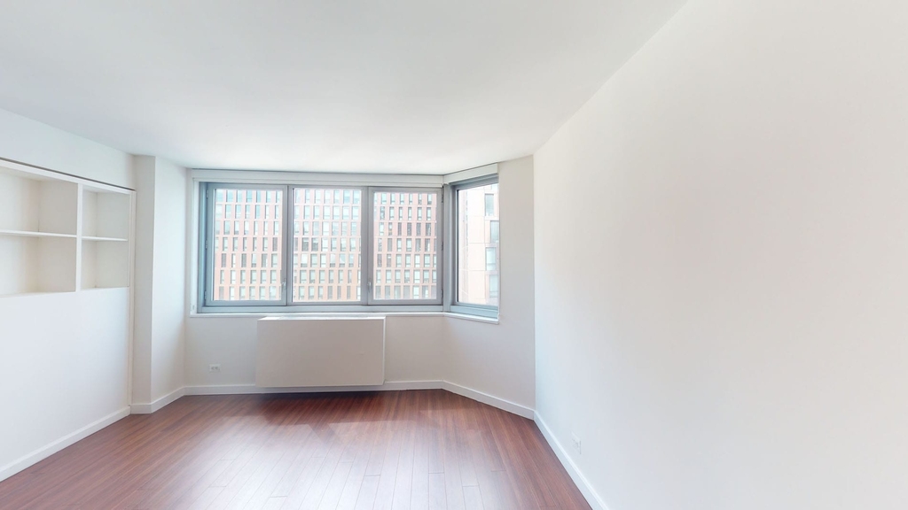 401 E 34th St - Photo 1