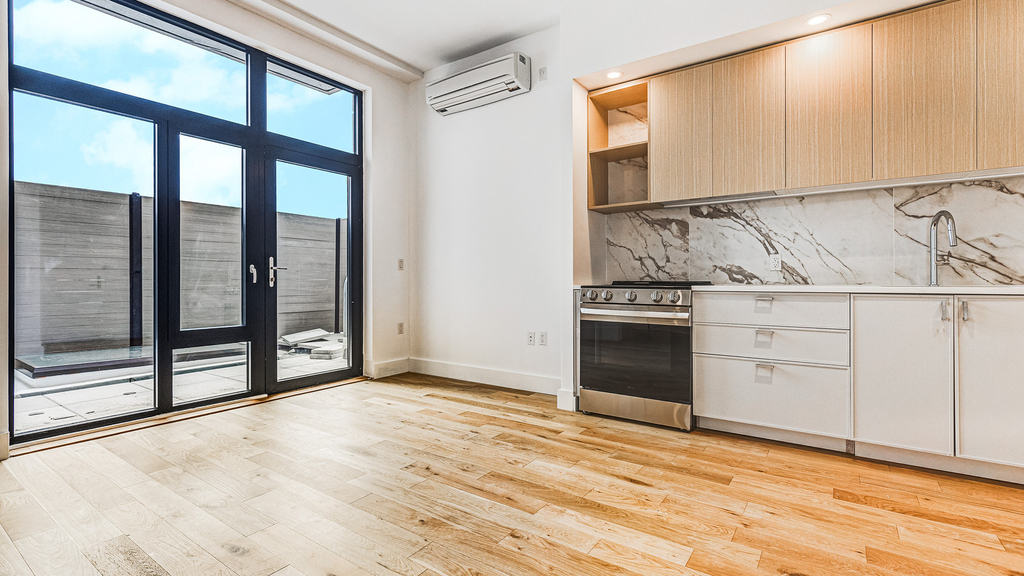 38-38 32nd St 11101 - Photo 1