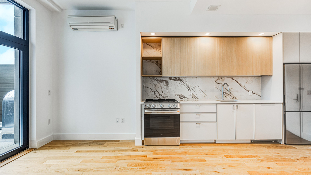 38-38 32nd St 11101 - Photo 0