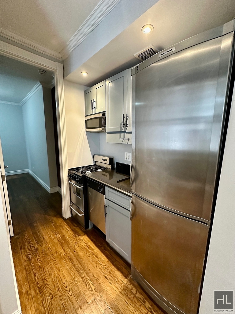 E 13th St. - Photo 2