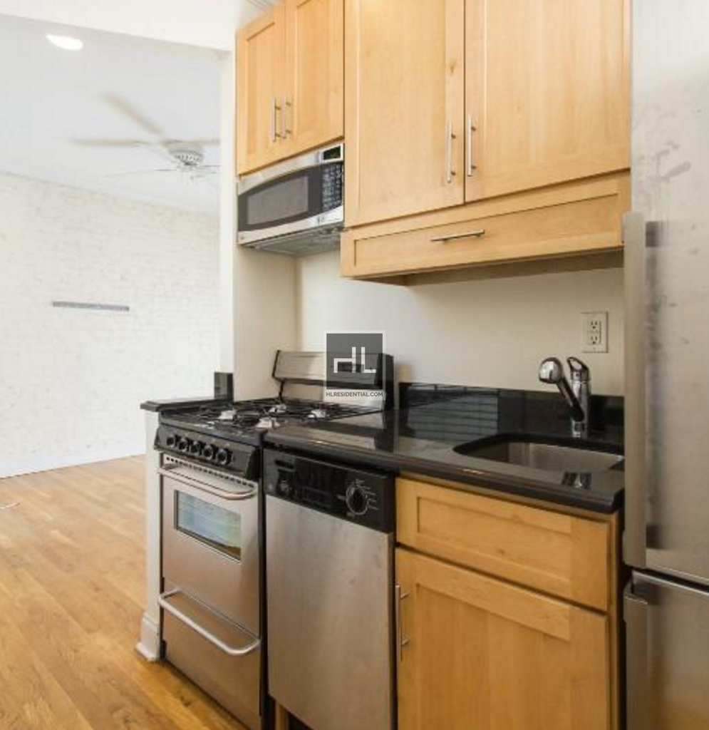 E 13th St. - Photo 3