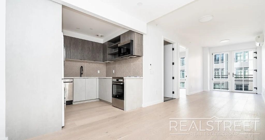 37-25 32nd Street - Photo 2