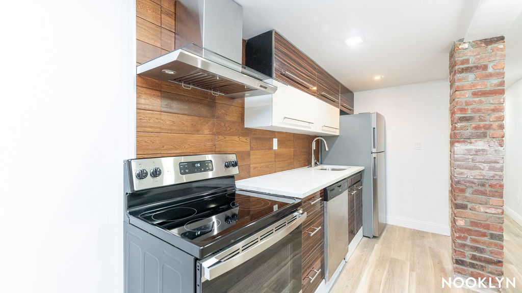 105 Weirfield St 11221 - Photo 1
