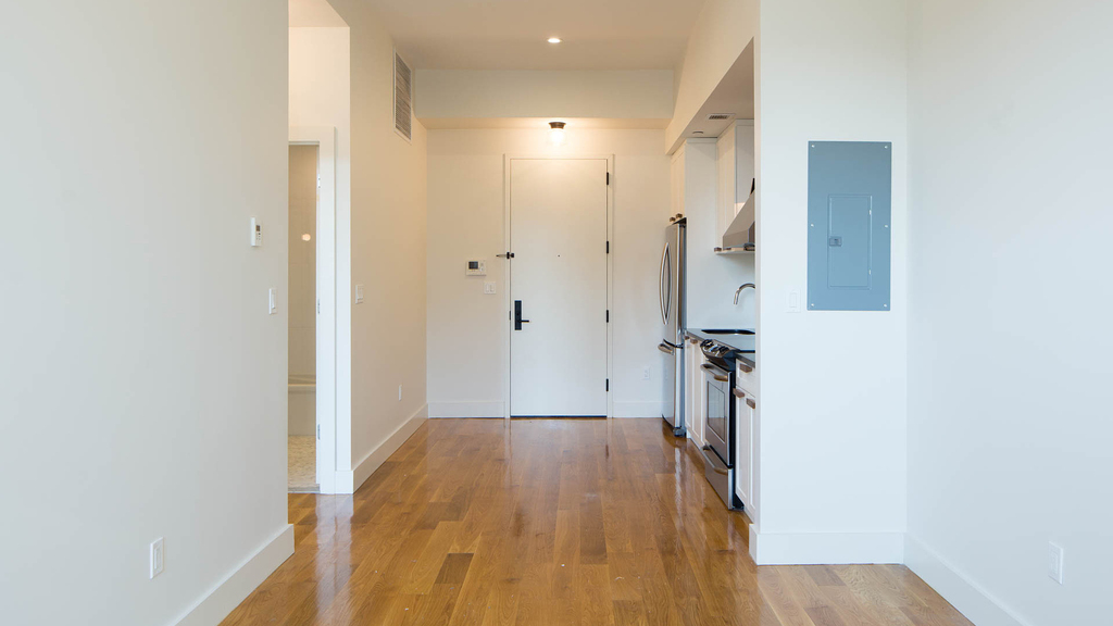55-27 Myrtle Ave 11385 - Photo 8