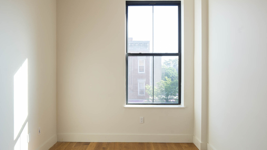 55-27 Myrtle Ave 11385 - Photo 10