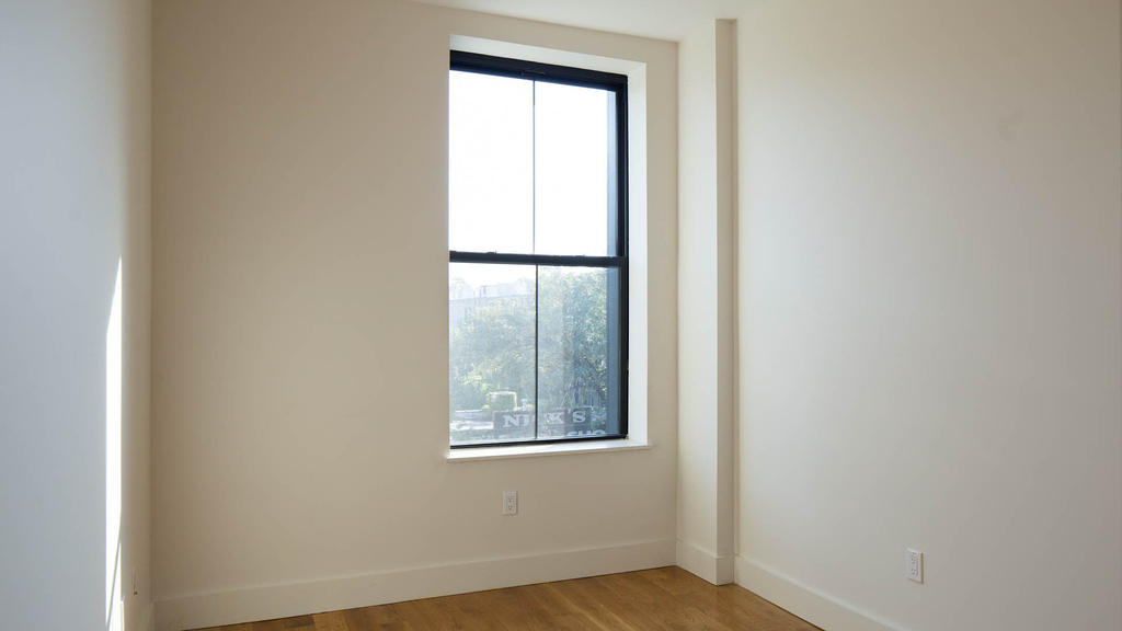 55-27 Myrtle Ave 11385 - Photo 4