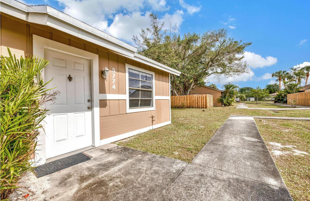 3774 92nd Lane N - Photo 0