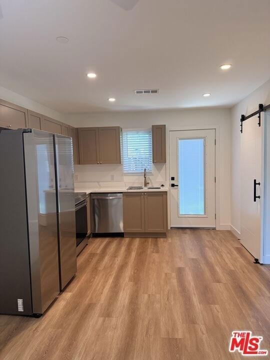 6626 1/2 Woodlake Avenue - Photo 0