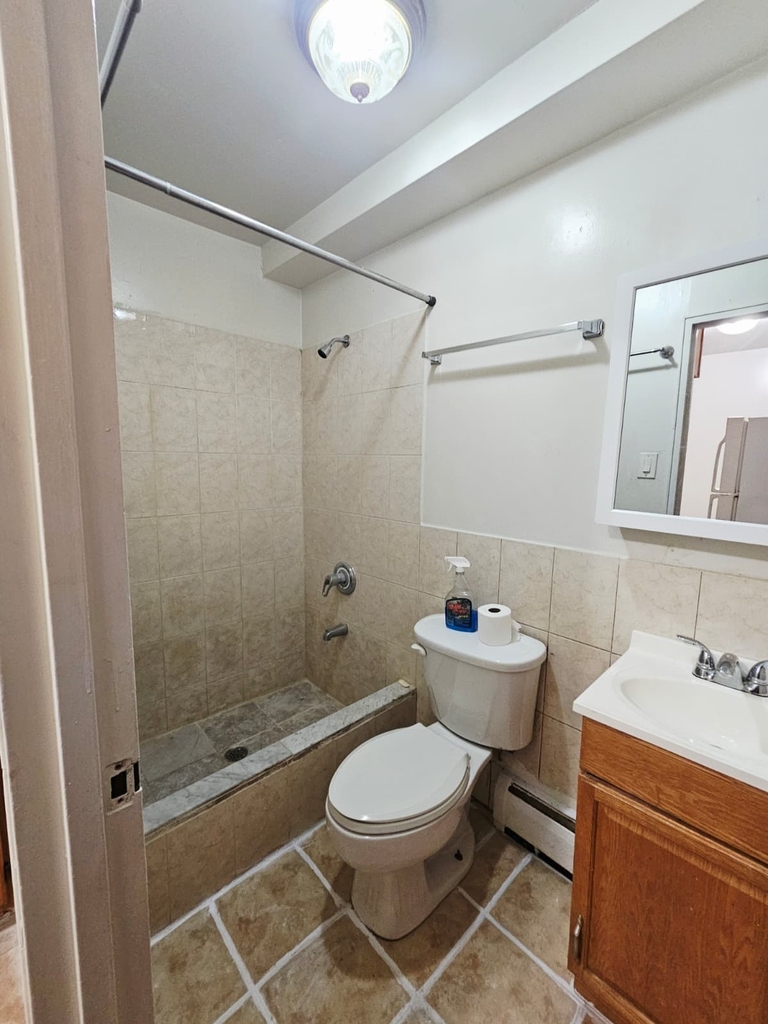 Affordable Brooklyn Living: 2BR, 1BA, Utilities Paid at 107th Street Brooklyn - Photo 8