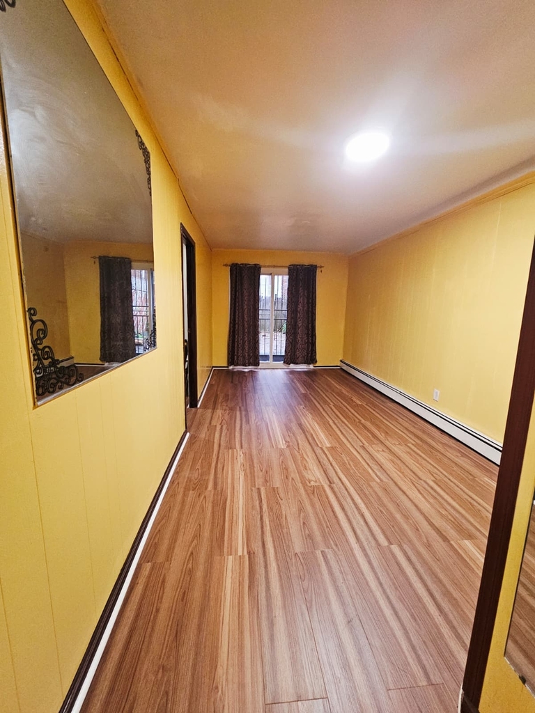 Affordable Brooklyn Living: 2BR, 1BA, Utilities Paid at 107th Street Brooklyn - Photo 0