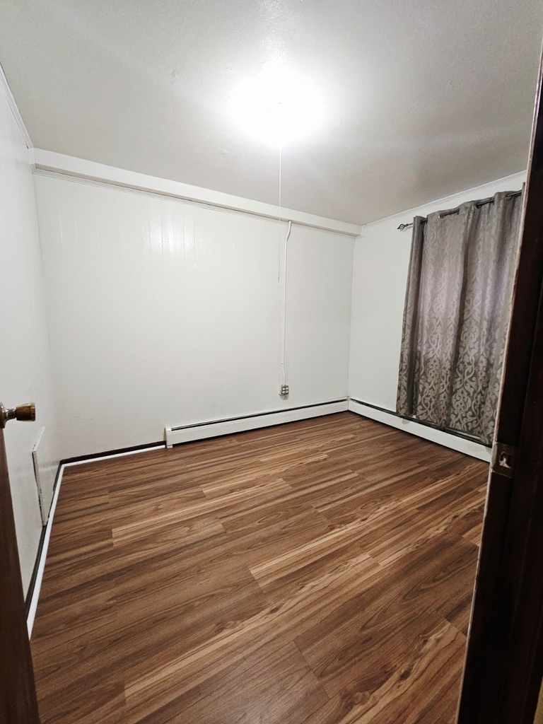Affordable Brooklyn Living: 2BR, 1BA, Utilities Paid at 107th Street Brooklyn - Photo 2