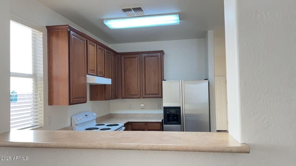 10018 W Winslow Avenue - Photo 3