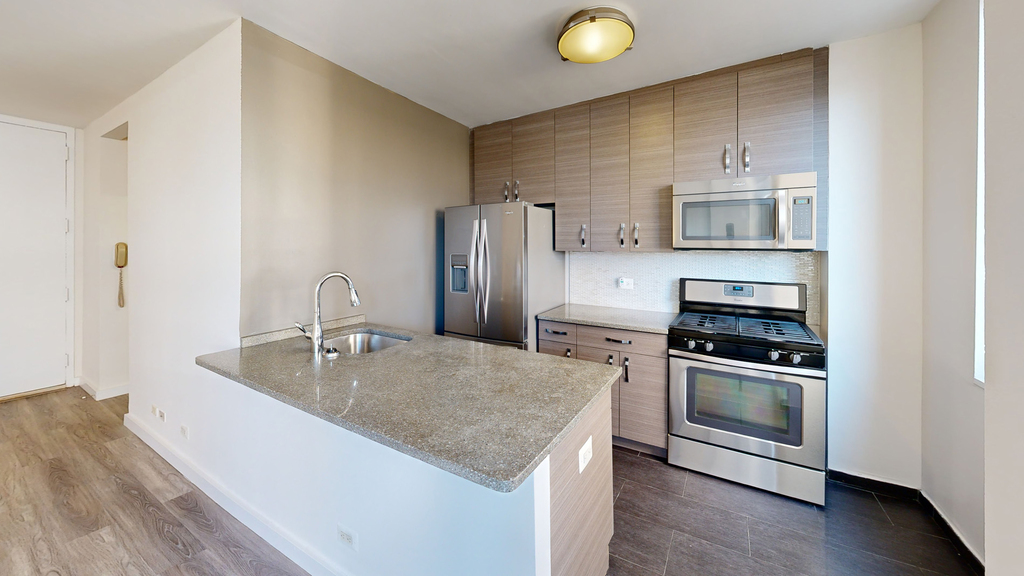 401 E 34th St - Photo 1
