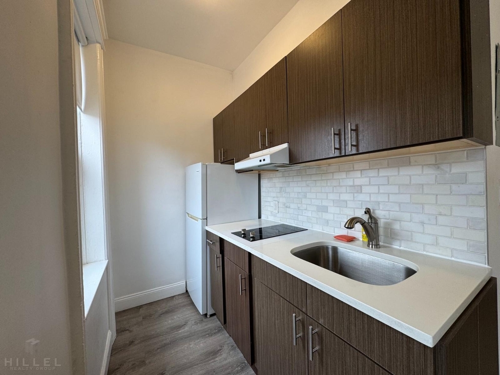 56-56 Myrtle Avenue - Photo 1
