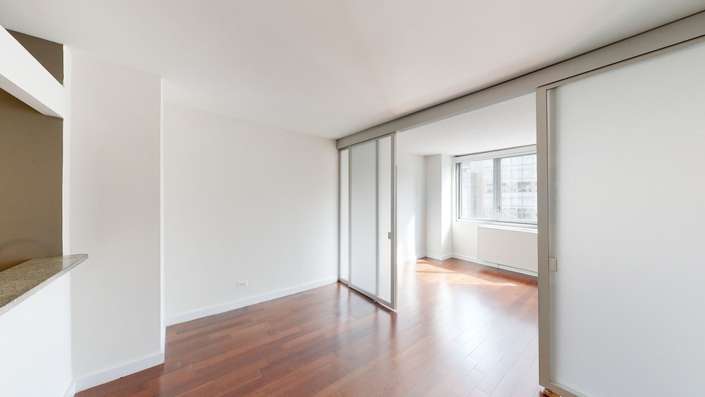 401 E 34th St - Photo 2