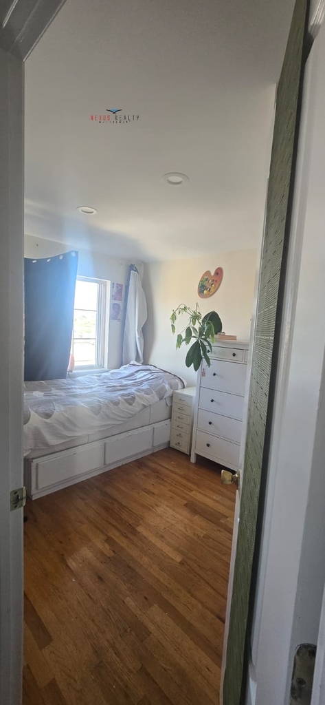 19-41 76th Street - Photo 0