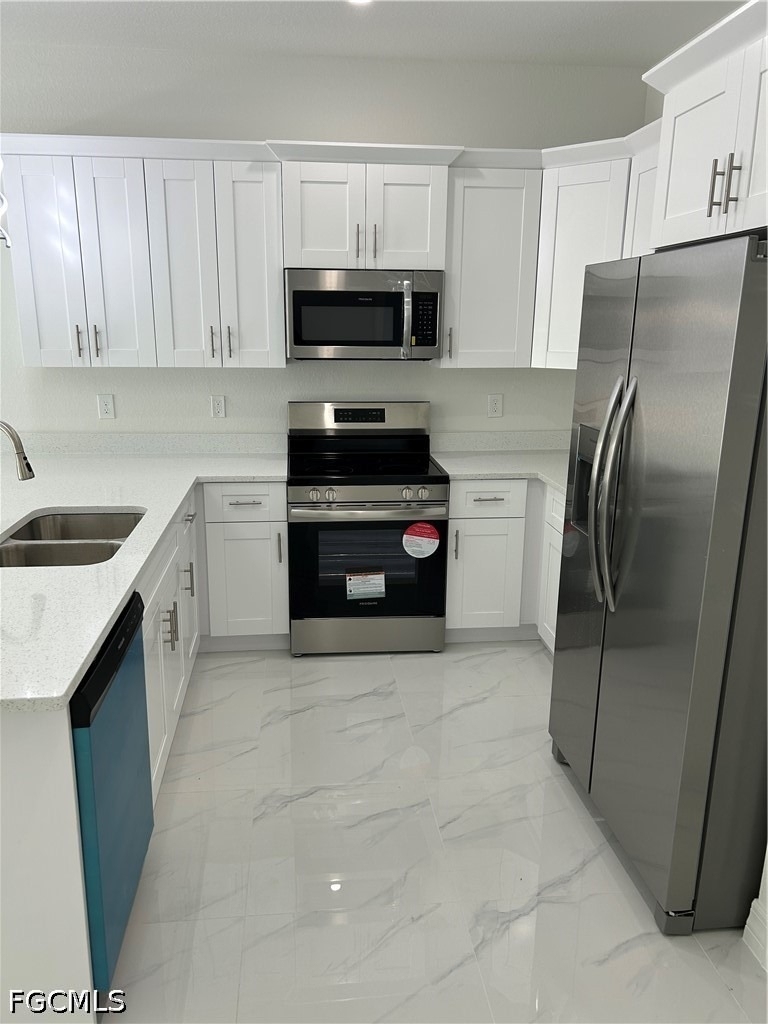 701-703 W 12th Street - Photo 2