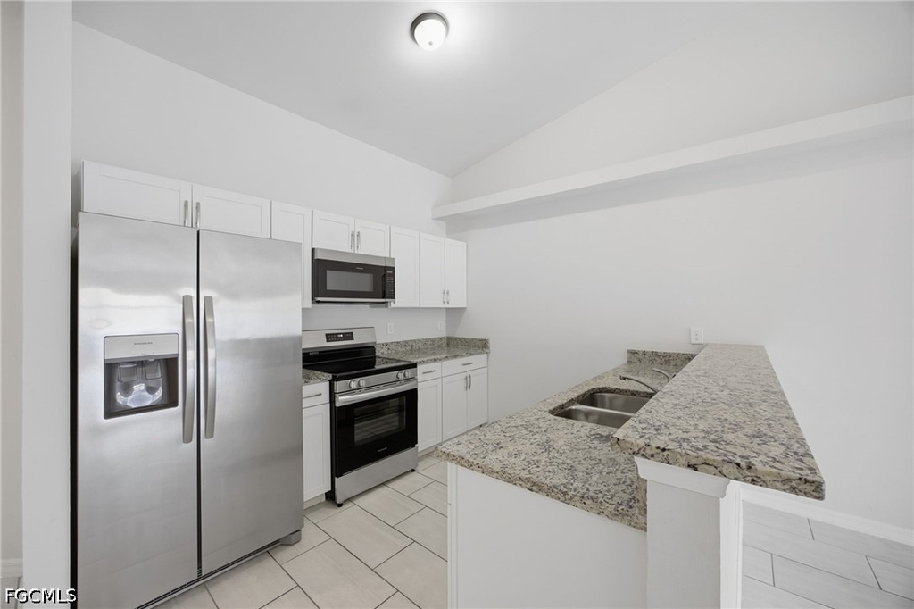 1426/1428 Cape Coral Parkway W - Photo 2