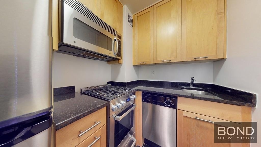 236 East 36th Street  - Photo 1