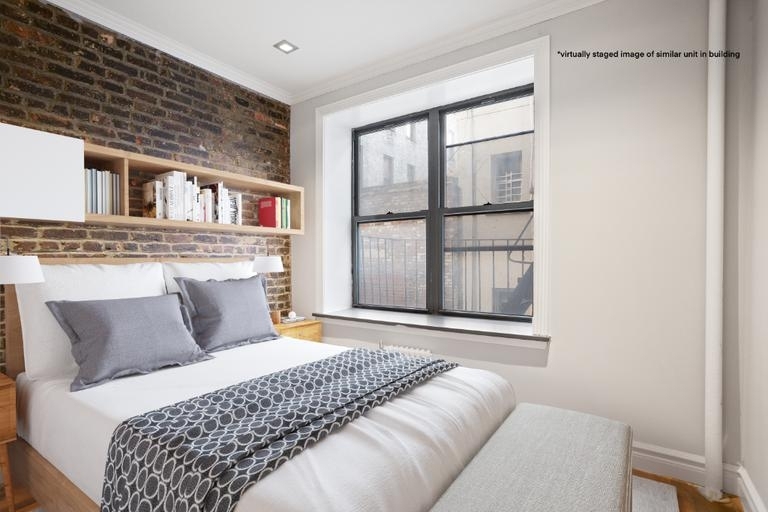 Copy of 432 East 13th Street, Unit 38 - Photo 0