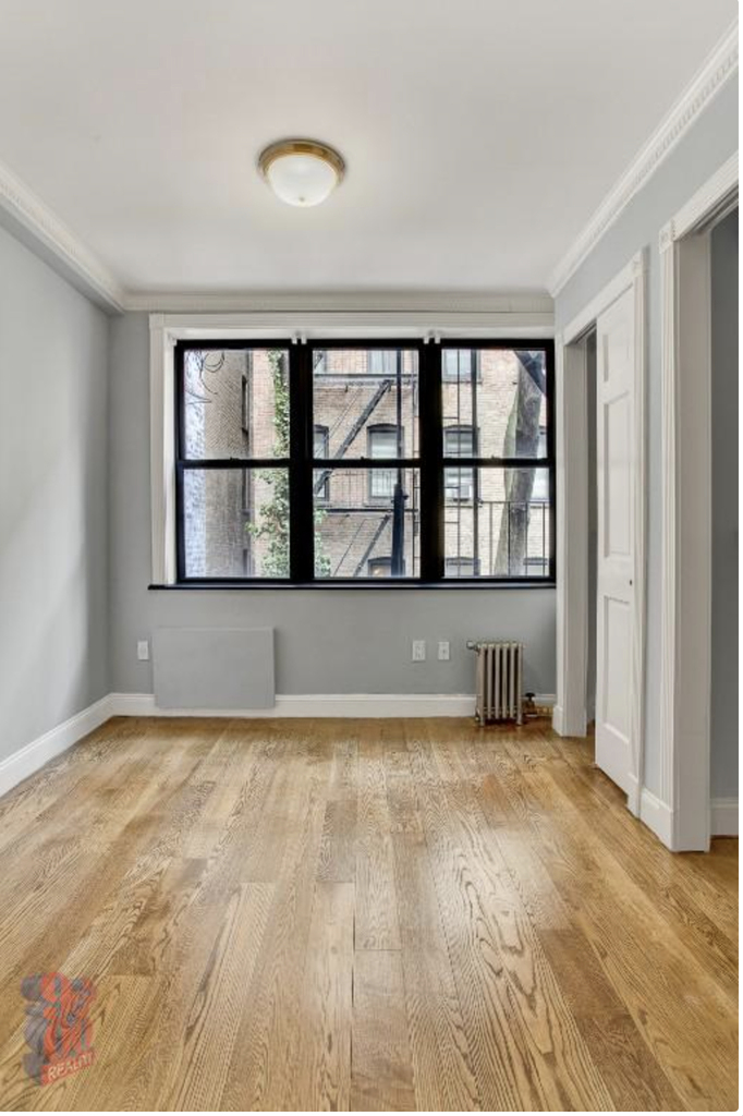E 26TH ST - Photo 3
