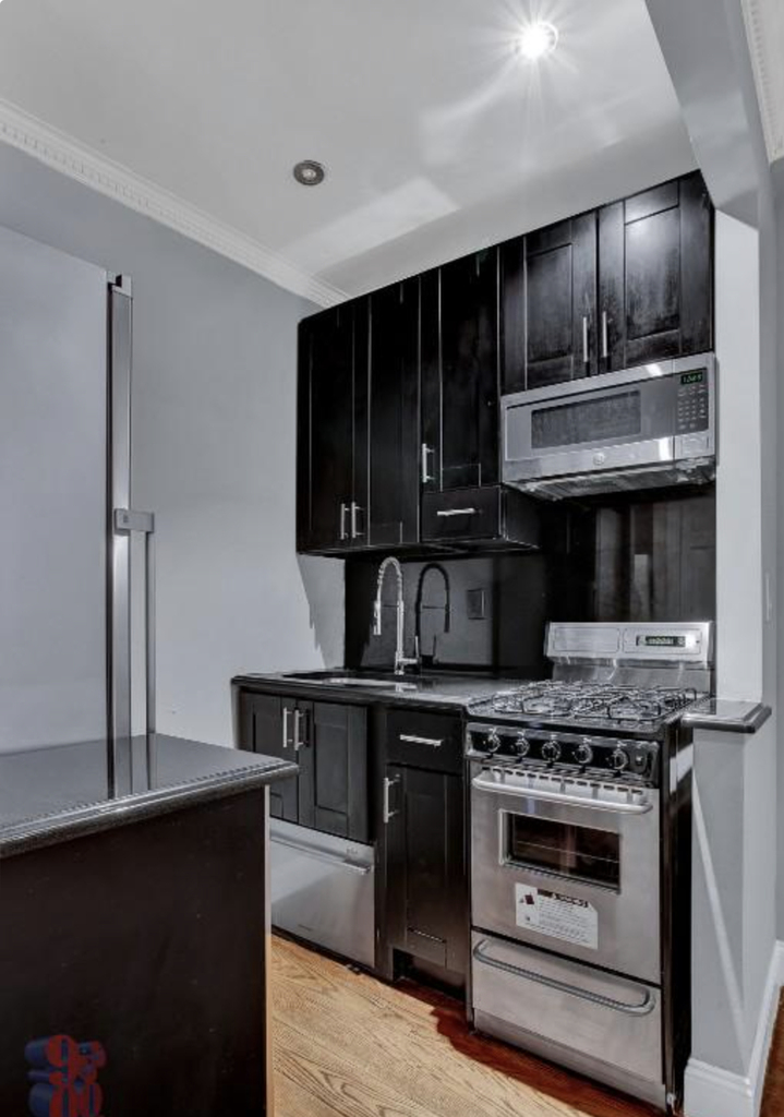 E 26TH ST - Photo 2