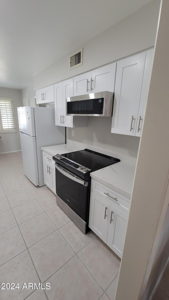 10715 W Tropicana Circle - Photo 17
