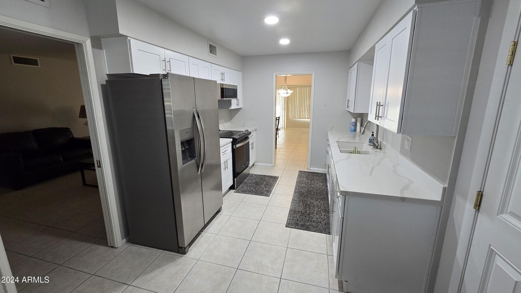 10715 W Tropicana Circle - Photo 2