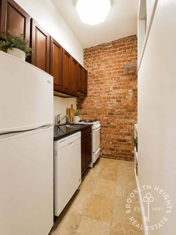 211 Clinton St. - Photo 2