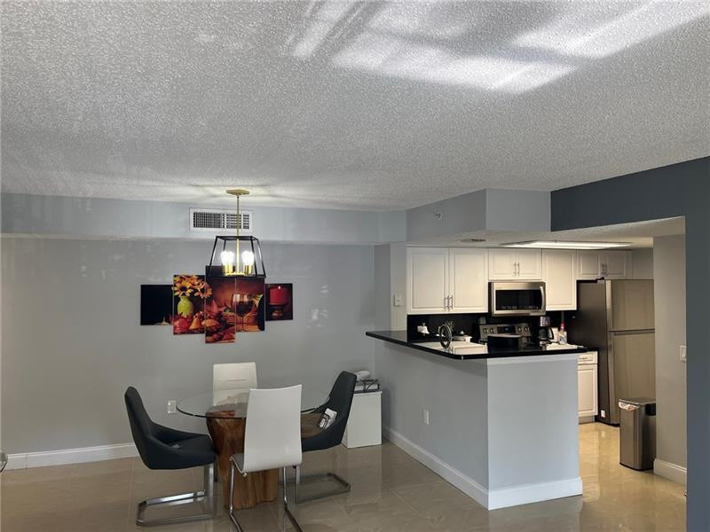 5051 Wiles Road - Photo 2