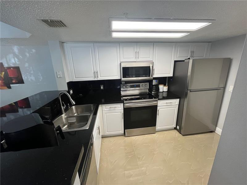 5051 Wiles Road - Photo 5