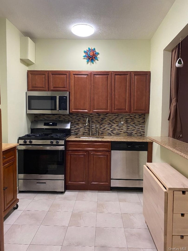 63-60 102nd Street - Photo 2