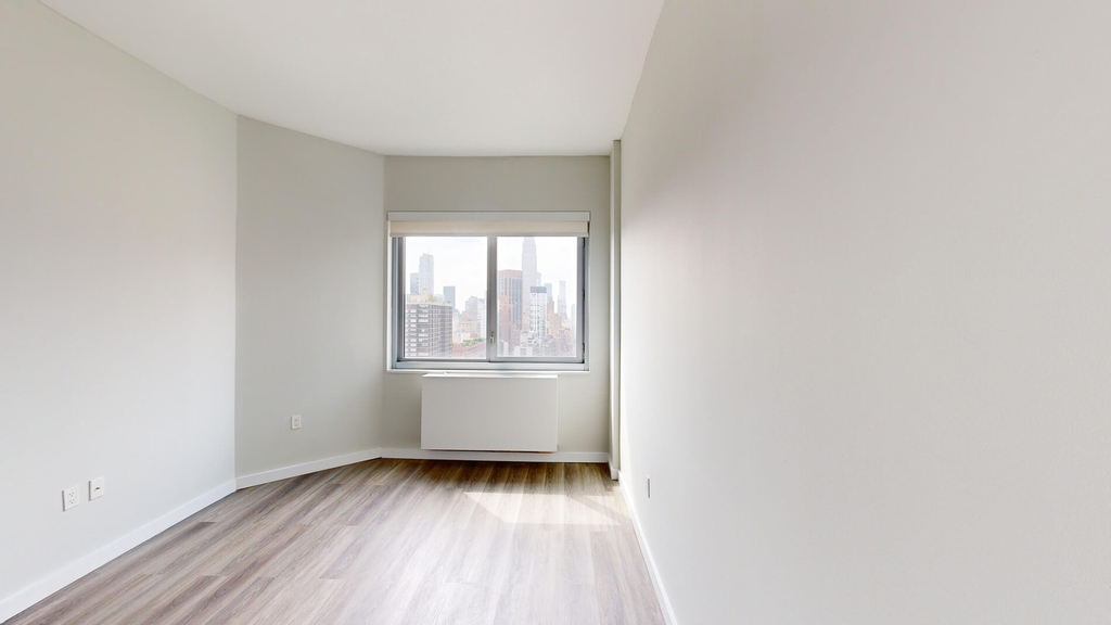 401 E 34th St - Photo 4